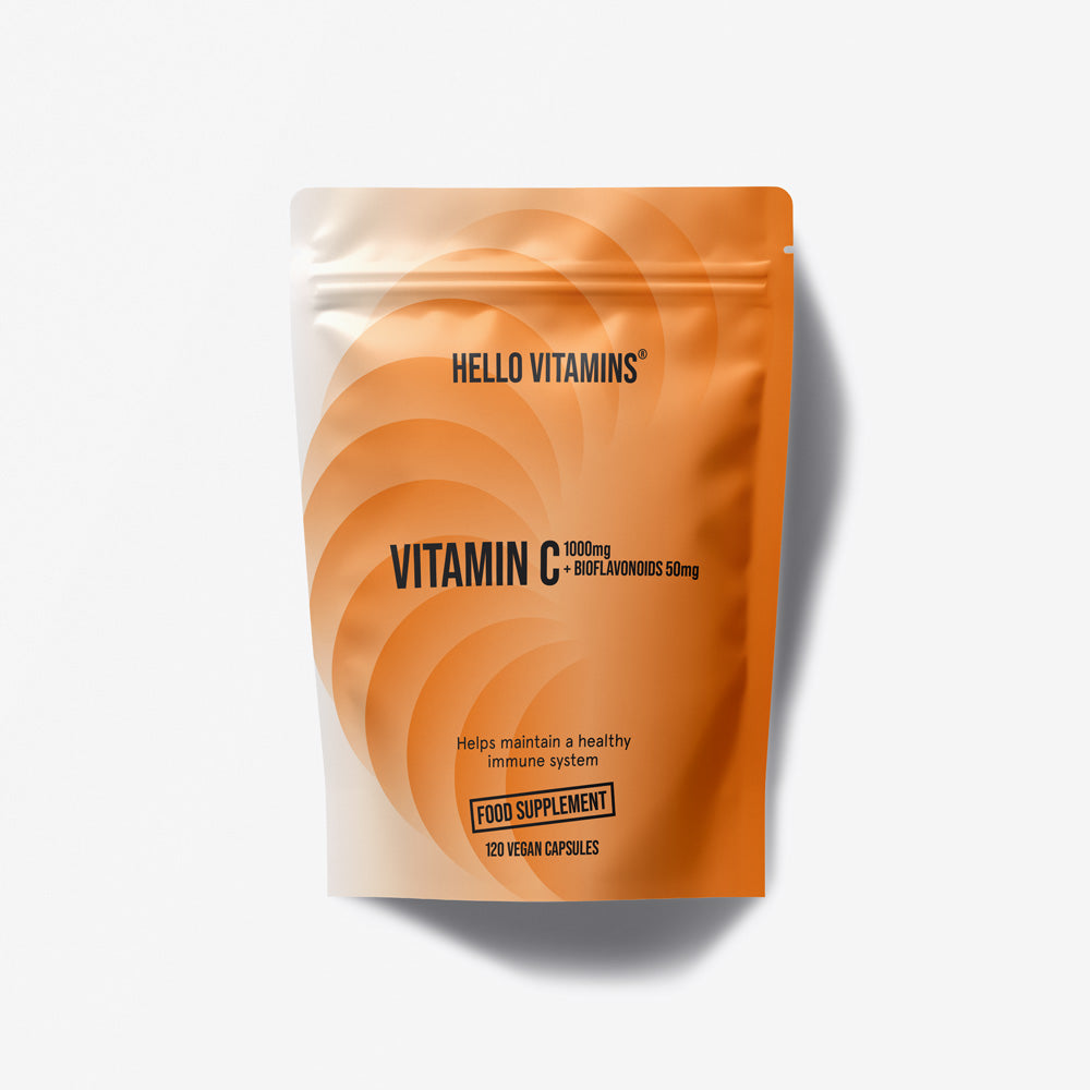 Orange supplement package for Vitamin C with 'Hello Vitamins' branding on a white background