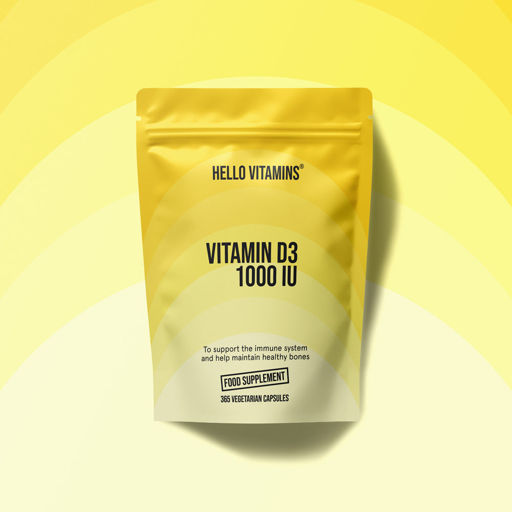 Yellow package of Hello Vitamins Vitamin D3 1000 IU on a yellow background